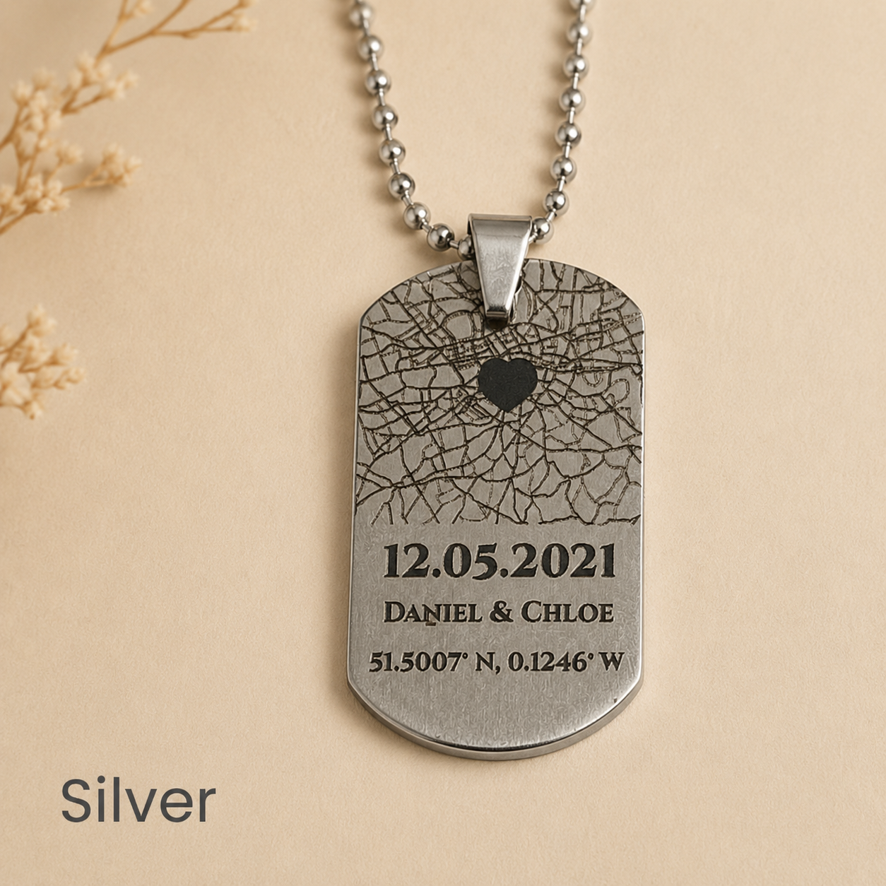 Silver custom map necklace pendant with engraved-effect map, date, names and coordinates